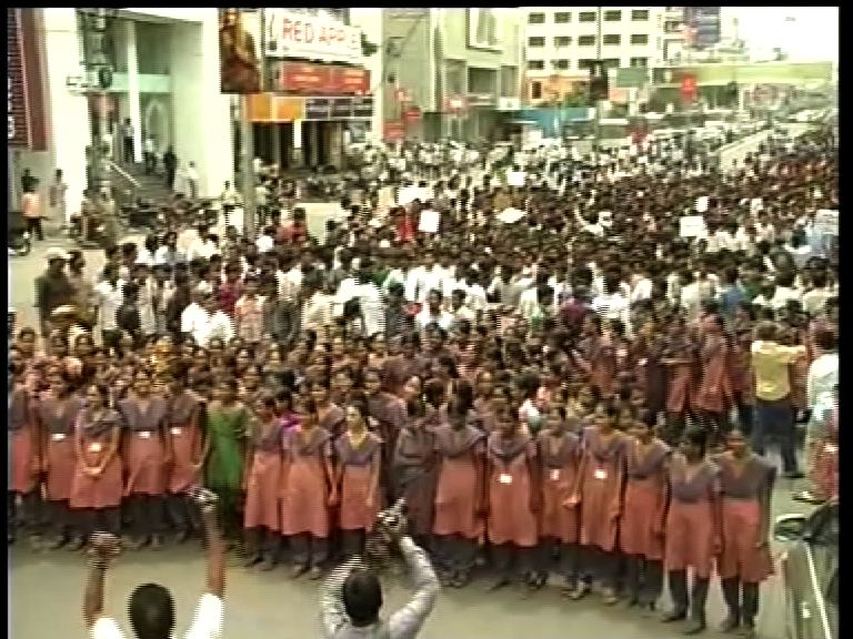 Protesting against bifurcation of Andhra Pradesh, students hit the streets in Vijayawada.